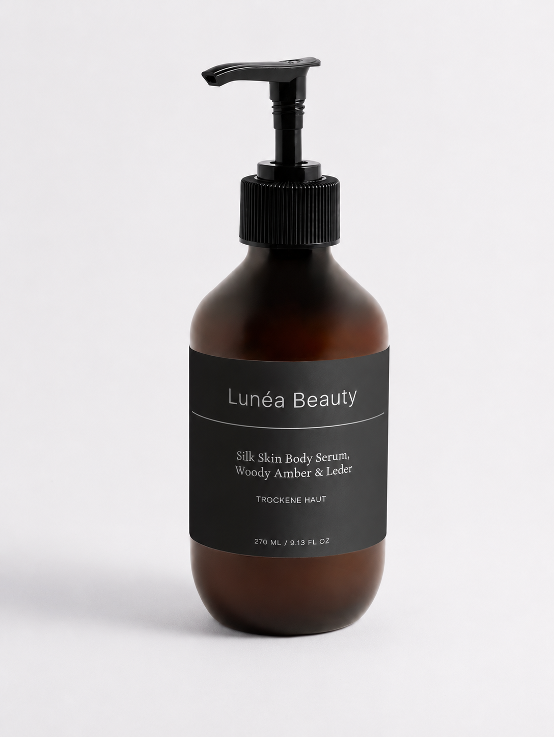 Silk Skin Body Serum, Woody Amber & Leder